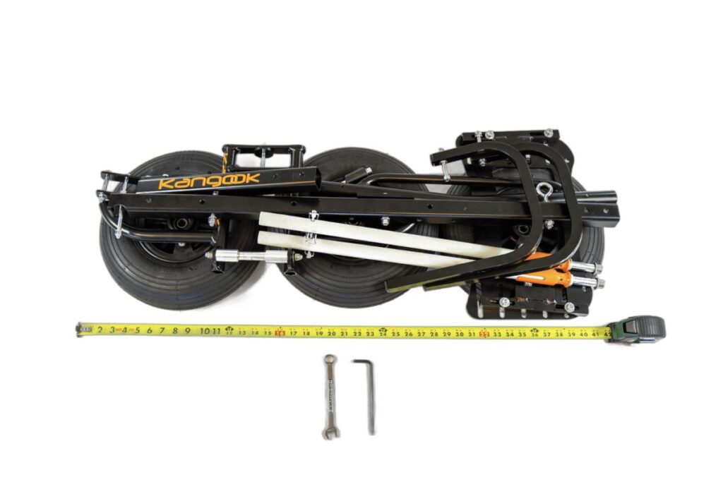 Close-up of Kangook Basik wheel, highlighting the trike's compact and lightweight design for easy setup.